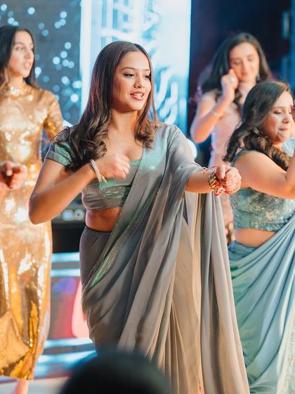 A group of friends and family members dancing their hearts out on stage. I can handle groups of any size.