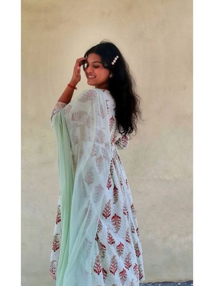 For a softer, more traditional daily look, I styled this beautiful block-printed Anarkali suit. The light green dupatta adds a fresh contrast to the white and red print.