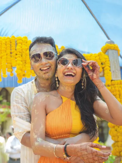 The Haldi ceremony is all about vibrant colors and unrestrained fun. I captured this couple's playful energy and laughter, a candid moment that shows the genuine joy shared with family and friends.