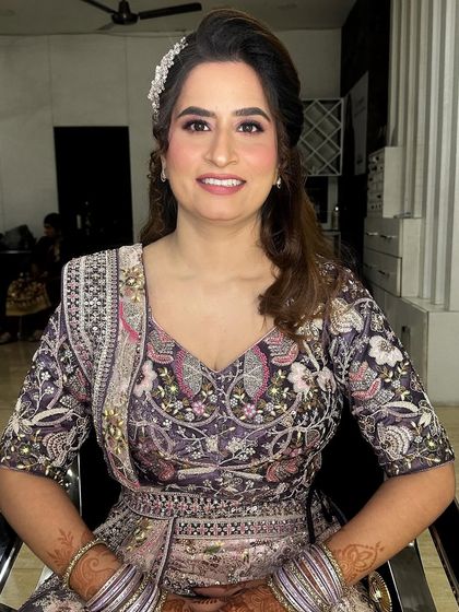 A happy client is a beautiful client. Her smile shows how confident and glamorous she feels with her party makeup.