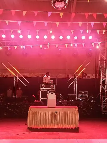 Getting the party started with a professional DJ stage and lighting rig. Our indoor hall is equipped to handle the technical needs of any high-energy event.