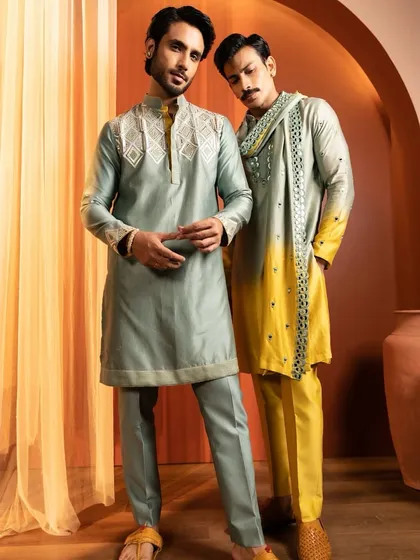 Another look from the Kaaj Button campaign, showcasing grooming on two models. Each look is tailored to the individual's features while maintaining a cohesive, clean aesthetic for the brand.