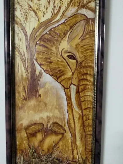 This framed coffee painting of an elephant shows just how stunning the final results can be. We work on techniques to create depth and texture, turning a simple medium into a piece of art you would be proud to display at home.
