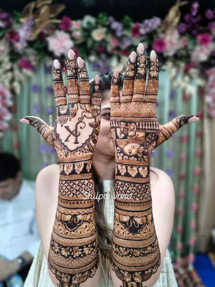 A final look at the stunning full-arm bridal mehndi, ready for the big day.