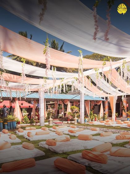 For a more relaxed and communal feel, we can arrange for low seating with comfortable cushions on our lawns, perfect for a casual mehendi or sangeet ceremony.