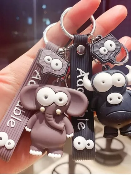 Check out these quirky animal keychains with googly eyes. They are available in elephant and bull designs and are sure to make you smile.