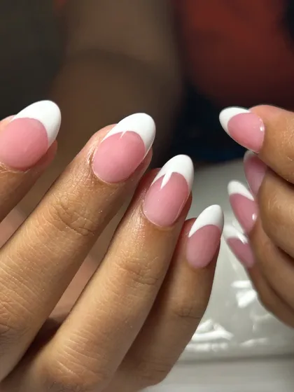 Another look at this flawless French manicure. The almond shape gives it a modern feel.