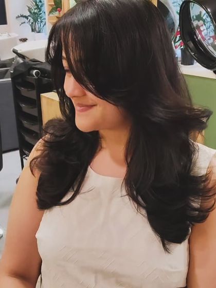 A side profile of a beautiful layered haircut, showing how the layers create shape and volume.