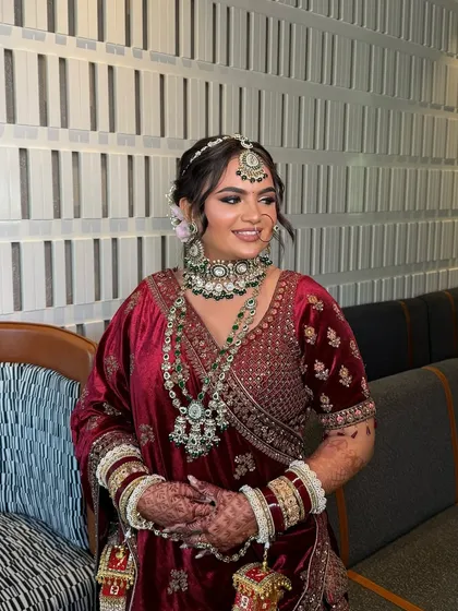My gorgeous bride Chandni, looking serene and beautiful on her wedding day. She wore a deep velvet lehenga, so we balanced it with a soft glam makeup look, focusing on glowing skin and defined eyes.