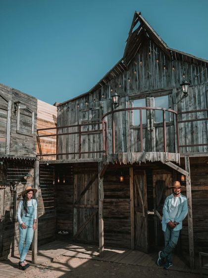 A wide shot of our rustic, Western-themed set. This is a fun and unique option for couples looking for a pre-wedding shoot that's a little different from the usual.