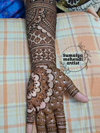 A single arm view of the mandala bridal design. The fine lines and repeating patterns are so mesmerizing to look at.