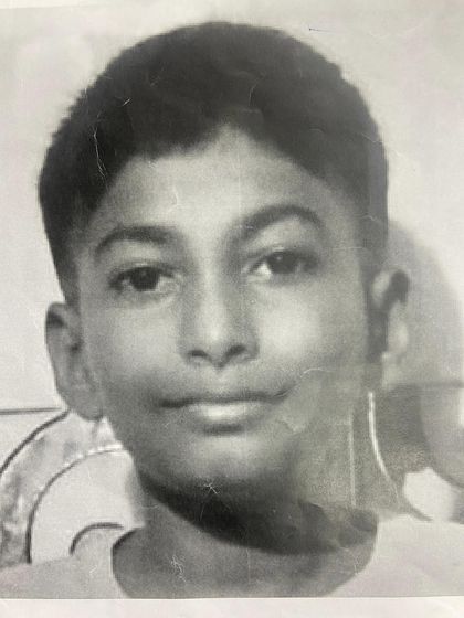 This is the original photograph the student used as a reference for his self portrait. We teach our students how to translate a photo into a hand drawn piece of art.