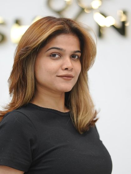 It's not just red, it's copper. A beautiful, warm copper tone paired with a fresh haircut.