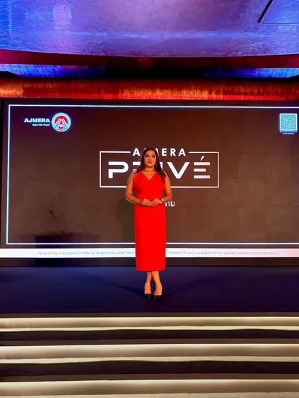 The stage is my comfort zone. Here I am at the Ajmera Privé launch, ready for the show to begin.
