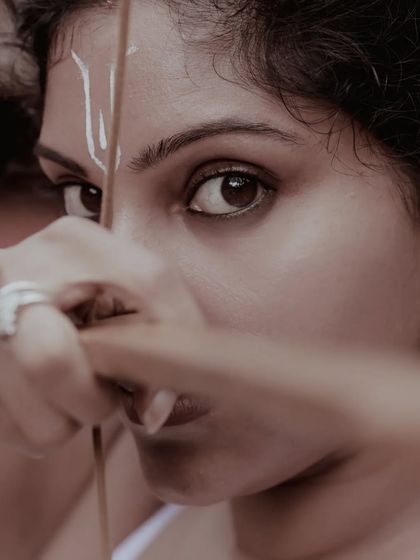 A female warrior concept shoot. These images showcase dynamic action poses, including mid-air shots with a bow and arrow, and serene moments with a horse, all set against a dramatic, smoky backdrop.