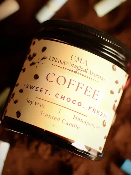 A close-up of my 'Coffee' scented candle, which I call a 'Warm Hug'. It's perfect for when you want your home to smell like your favorite cozy café.
