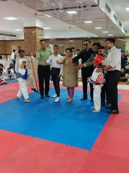 My young students being recognized by officials and guests at the championship event. It is a great honor for them to be acknowledged for their hard work and discipline.