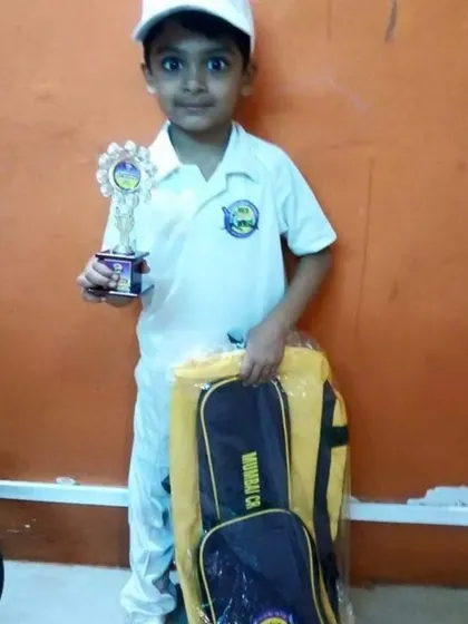 A very young Parth with his first trophy and cricket kit. This is where the journey begins.