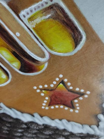 A detail shot of the glowing windows of the gingerbread house.