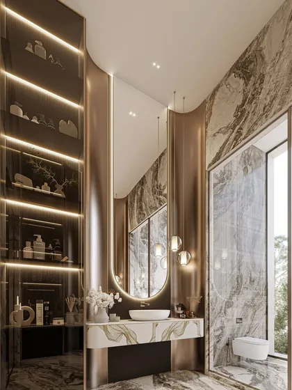 This bespoke bathroom is designed as a private oasis, blending rich marble textures with soft ambient lighting and custom metallic details. It is a harmonious fusion of sophistication and serenity, transforming a personal space into a haven of indulgence.