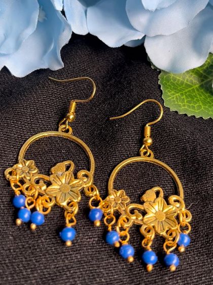 A collection of my simple, budget-friendly daily wear earrings in various blue and gold designs, perfect for college or office wear.