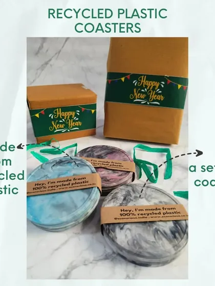 A set of four recycled plastic coasters, ready for gifting. Each set comes in eco-friendly packaging, making it an easy and meaningful gift for any occasion.