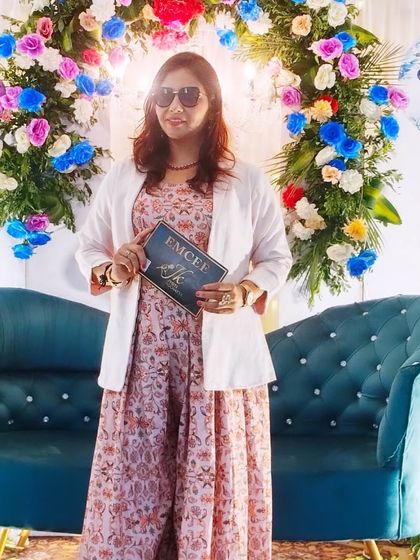 Posing with my mic booklet at the Dhund ceremony. Ready to bring fun and games that bridge generations and make the celebration special for everyone.