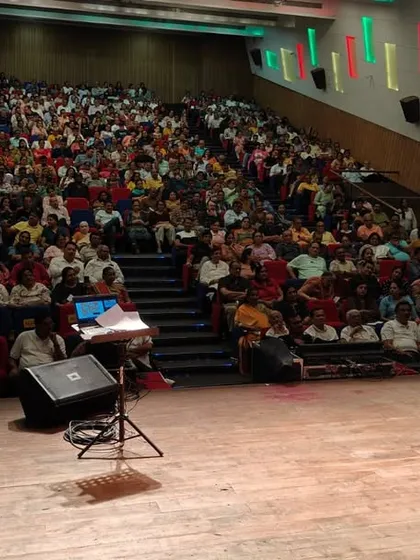 Another angle of the packed auditorium for the JJC Borivali show. Every seat is filled, and the energy is palpable.