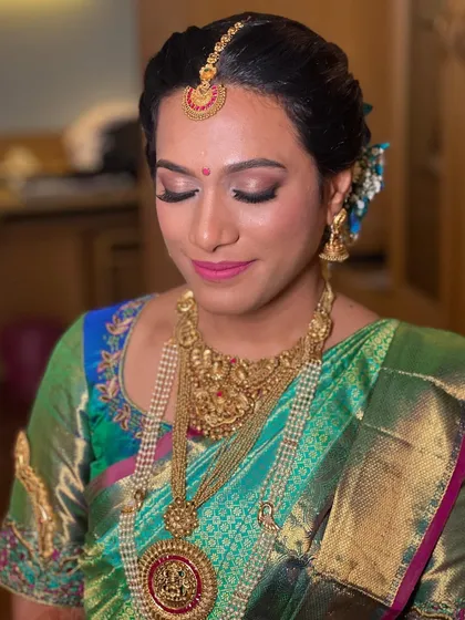 A beautiful, natural makeup look for this South Indian bride. The focus was on creating a flawless base, soft shimmery eyes, and a pretty pink lip to complement her silk saree.