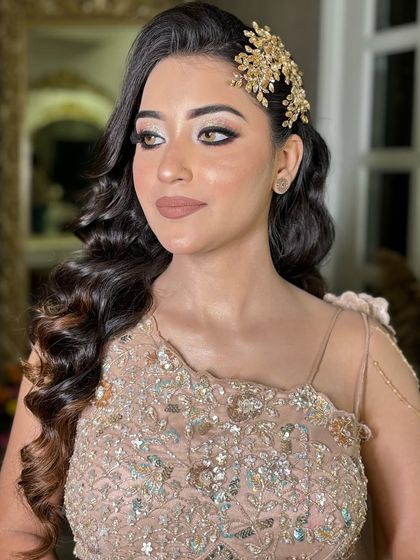 Another angle of the soft glam party look. The side-parted waves and the shimmery eyeshadow create a romantic and elegant vibe.