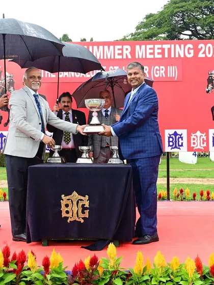 The presentation of The Bangalore St. Leger (Grade III), a classic race with a long and storied history. Even on a rainy day, the ceremony proceeds with dignity, showcasing our commitment to our partners.