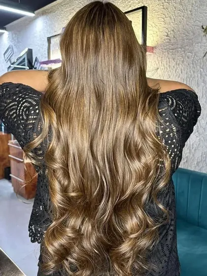 Another view of this stunning balayage. The length and waves really show off the beautiful color work.
