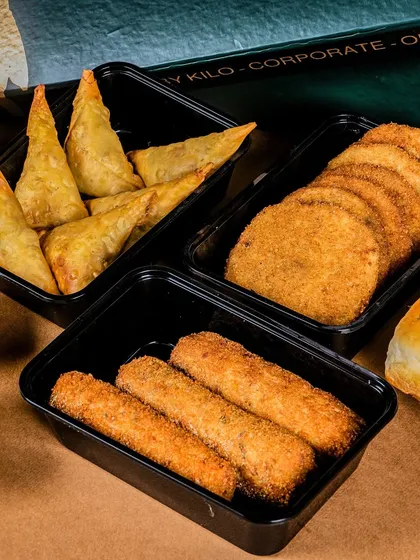 A look at my appetizer boxes, perfect for gifting or small events. This box includes Chicken Irani Samosas, Basil Chicken Cheese Cutlets, and Swiss Rolls.