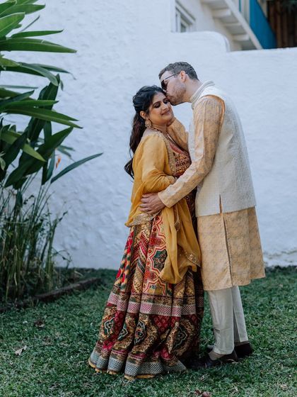 A collection of portraits from a beautiful Haldi photoshoot. I coordinate with the photo team to capture a variety of shots, from romantic close-ups and playful kisses to stylish individual portraits, all within a cohesive, sun-drenched theme.