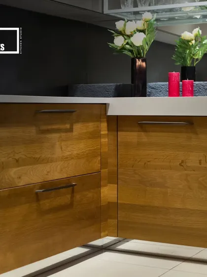Every detail is crafted for seamless function, like these wooden cabinets with sleek, minimalist handles.