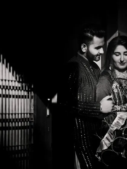 A dramatic black and white portrait of Jaydeep and Richa. I used strong shadows and light to create a moody, high-contrast image that feels both intimate and artistic.