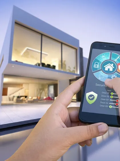 We put complete control of your home's security in the palm of your hand. This image shows how our integrated smart home systems allow you to monitor cameras, manage locks, and check security status from a single, intuitive mobile application.
