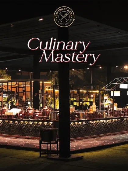 A sprawling buffet setup at night, showcasing our "Culinary Mastery" with an impressive array of dishes and elegant decor.