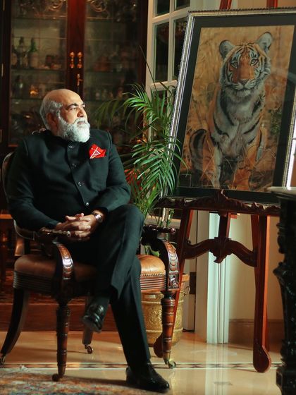 An off-camera glance adds a contemplative and powerful mood to this executive portrait.