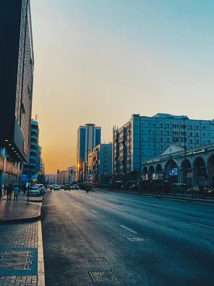 An empty Dubai street at dusk. The colors and the quiet moment in a bustling city caught my eye.