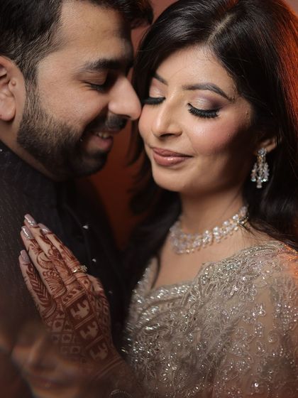 An intimate couple's portrait. The makeup is designed to look soft and beautiful in close-up, romantic shots.