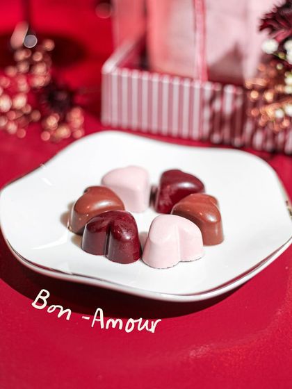 Bon-Amour. A plate of our assorted heart-shaped chocolates, a simple and sweet gesture for your Valentine.