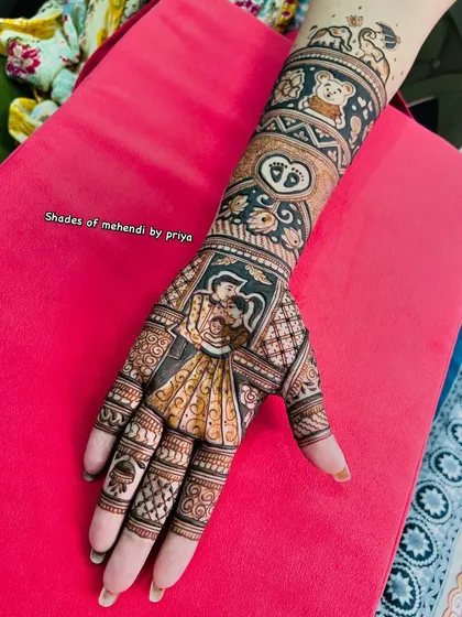 The full view of the completed baby shower mehendi, a beautiful and memorable design for the mom-to-be.