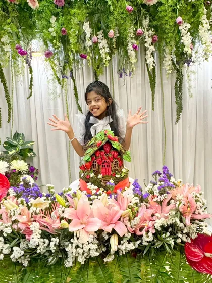 My daughter with her strawberry house birthday cake. Creating cakes that bring so much joy is the reason I love what I do.