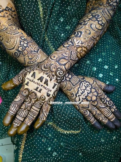 A beautiful design with the names 'Mubashir' and 'Nazia' written in English and Arabic.