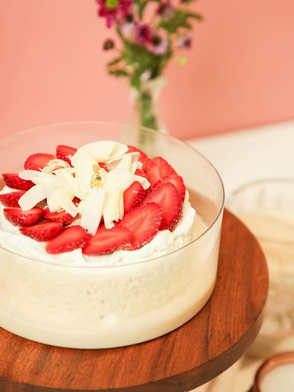 Our Strawberry Vanilla Tres Leches, a new addition to our collection. A light sponge soaked in three milks, topped with fresh strawberries and white chocolate shavings.