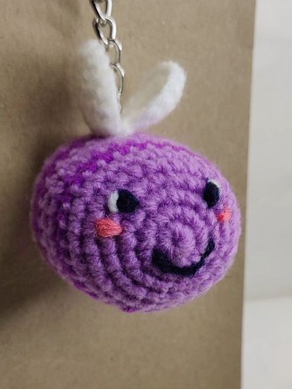 My super popular bumblebee keychains. They come in the classic yellow and black, but I also make them in fun colors like pink, blue, and purple.