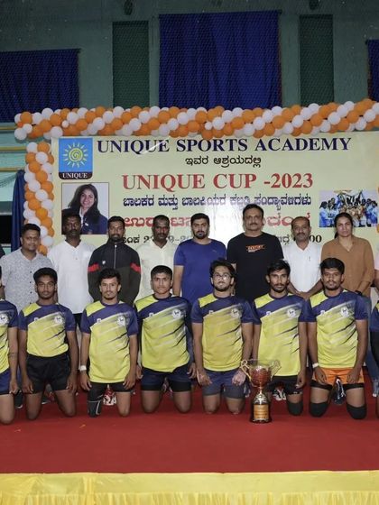 Another successful team from our Unique Cup 2023, posing with their trophy after the competition.