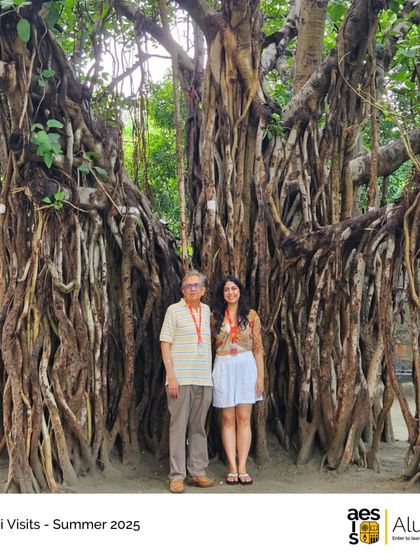 An alumna and her father, also an alumnus, visit the iconic banyan tree on campus. This landmark holds special memories for generations of students and their families.