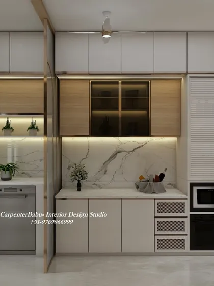 A kitchen with a clever sliding partition, allowing it to be closed off from the dining area when needed. The design is perfect for maintaining a clean look while entertaining.